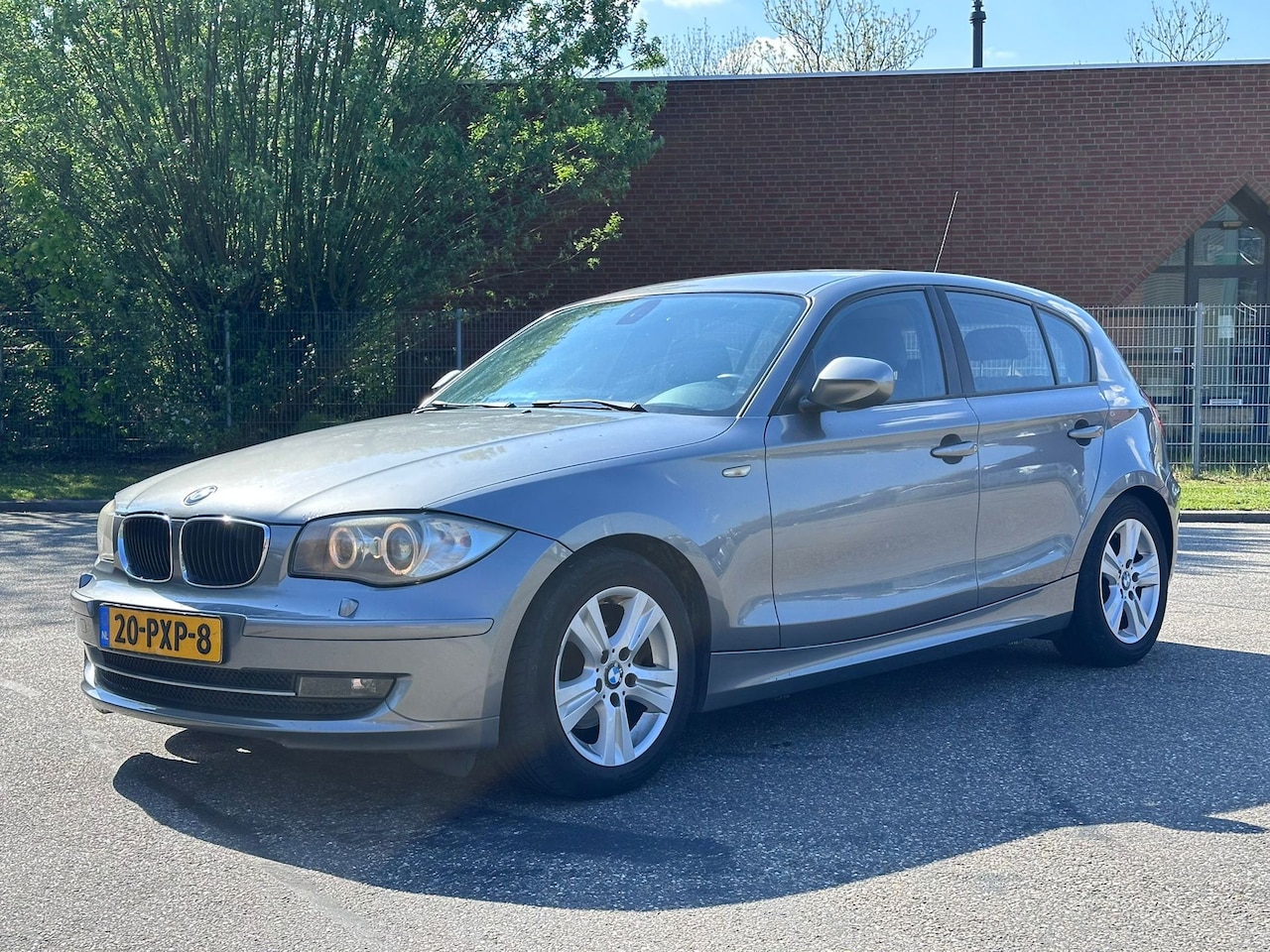BMW 1-serie - 116i EffDyn. Ed. Business Line Ultimate Edition 5DR*Leder*Cruise*Xenon*NAP*LM velgen*Clima - AutoWereld.nl