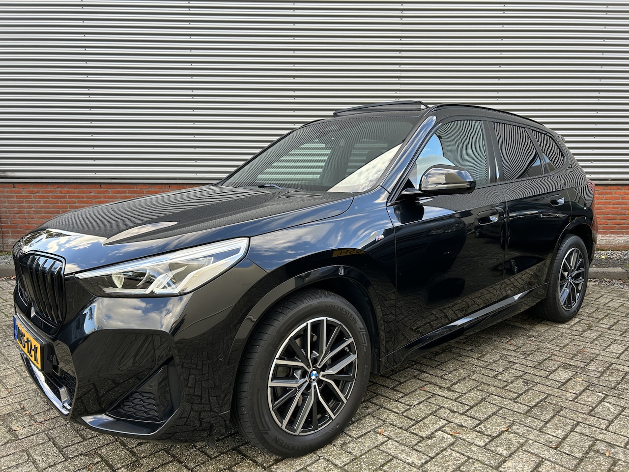BMW X1 - sDrive18i M Sport | Panoramadak | Adaptief M-onderstel | Dealer Onderhouden | - AutoWereld.nl
