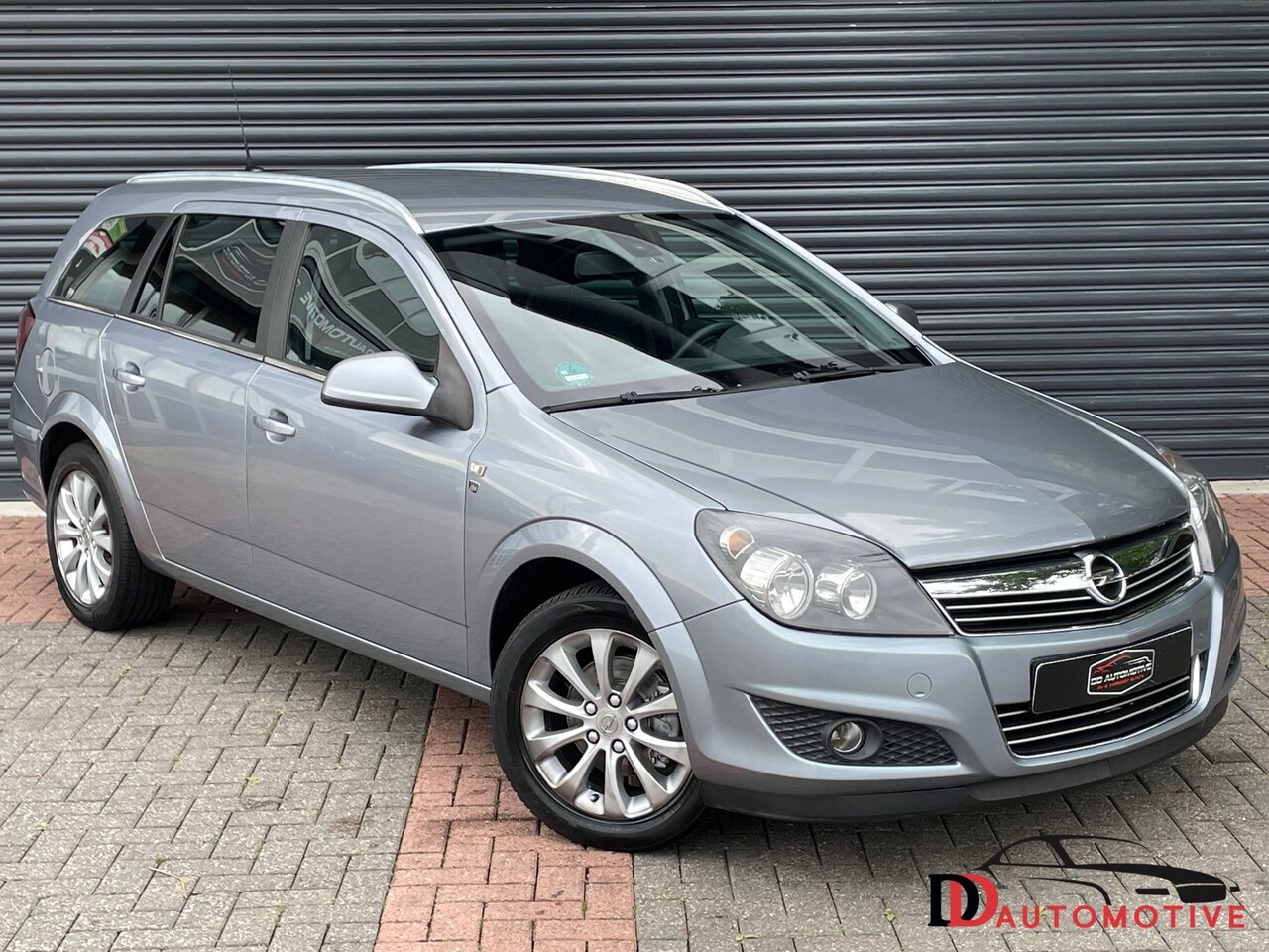 Opel Astra Wagon - 1.6 Cosmo Cruise | Trekhaak | Navi | Orgineel NL | Nap - AutoWereld.nl