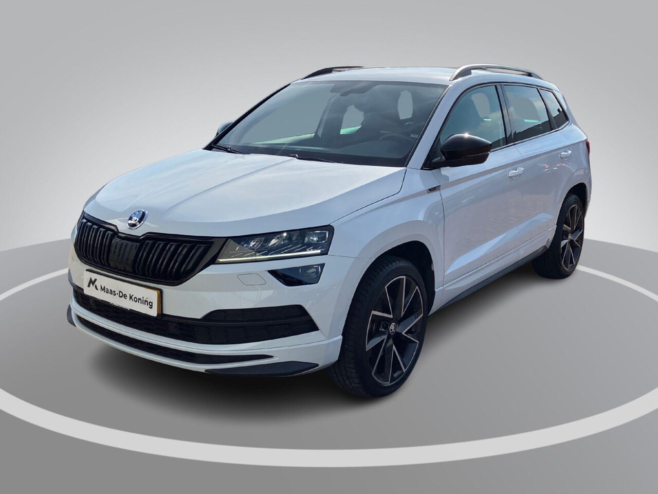 Skoda Karoq - 1.5TSI/150PK ACT Sportline Business · Trekhaak · Camera · Stoelverwarming · Apple/Android - AutoWereld.nl