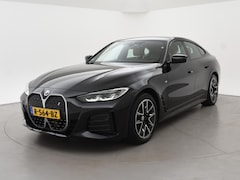 BMW i4 - eDrive40 84 kWh M-SPORT + ADAPTIVE CRUISE | SFEERVERLICHTING | LEDER SPORTINTERIEUR