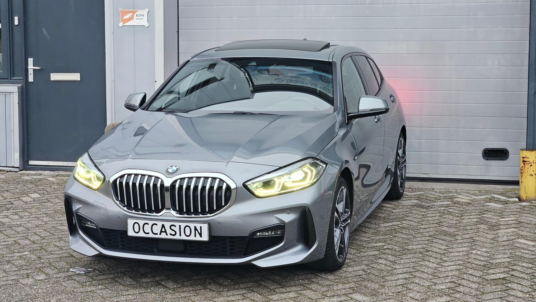 BMW 1-serie - 118i M-Sport | Orig. NL | PANO | Sfeerverl. | Carplay | ACC - AutoWereld.nl