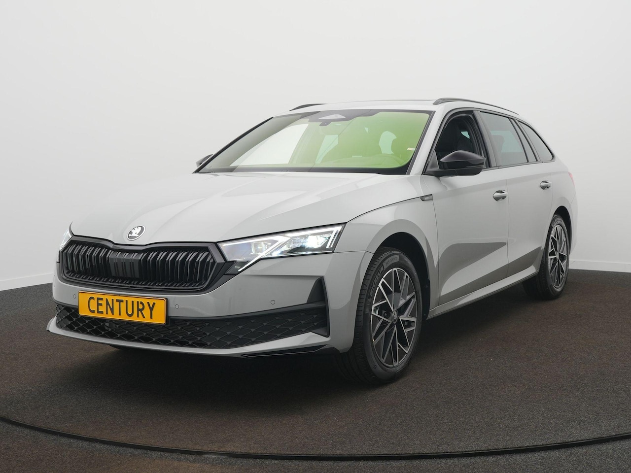Skoda Octavia Combi - Sportline Tour 1.5 TSI m-HEV 110 kW / 150 PK Combi Panodak | Camera | - AutoWereld.nl