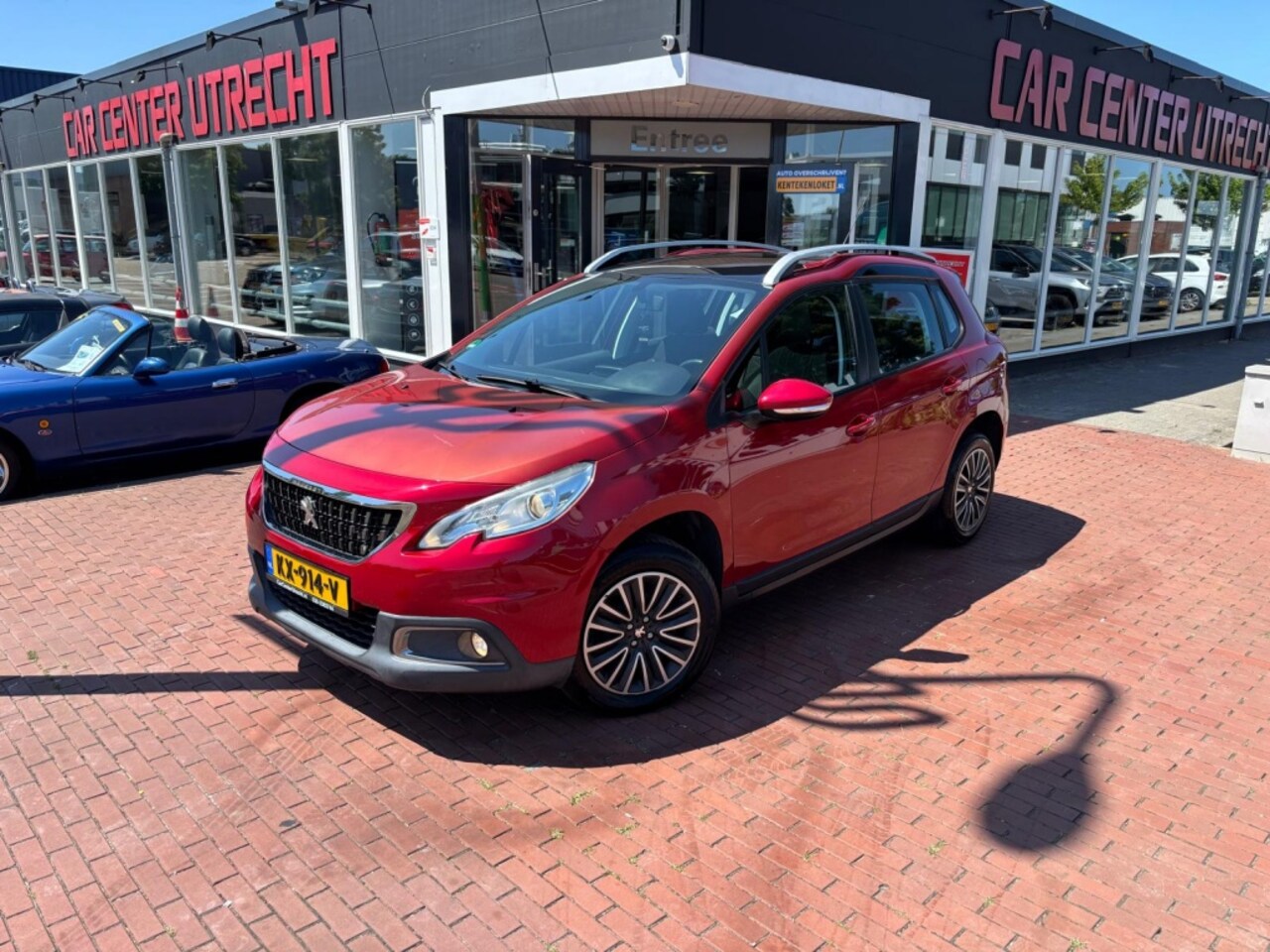 Peugeot 2008 - 1.2 PureT. Blue Lion | airco | navi | pano | - AutoWereld.nl