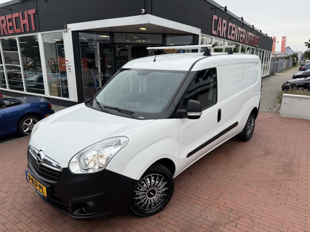 Opel Combo - 1.3 CDTi L2H1 Edit. airco trekhaak cruise control - AutoWereld.nl
