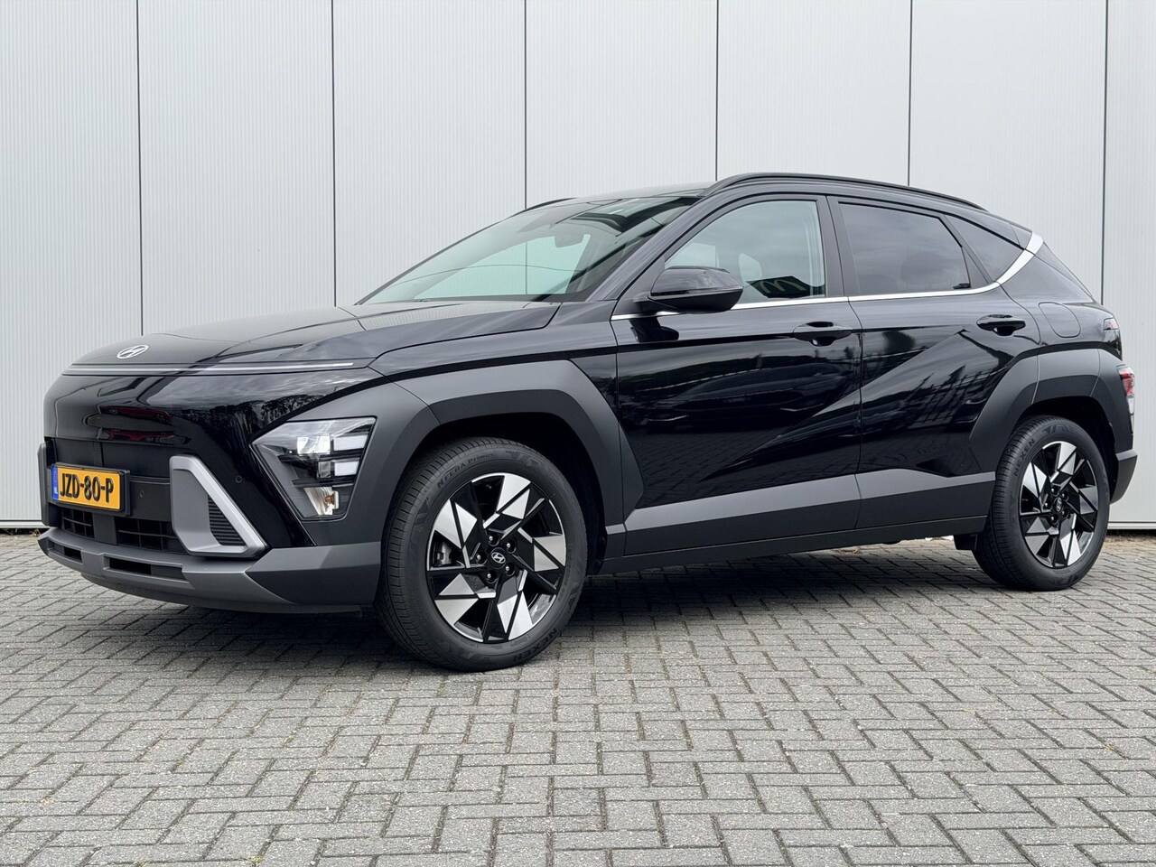 Hyundai Kona - 1.6 GDI HEV Comfort Smart / Fabrieksgarantie tot 2-2030 / Stoel- & Stuurverwarming / Navig - AutoWereld.nl