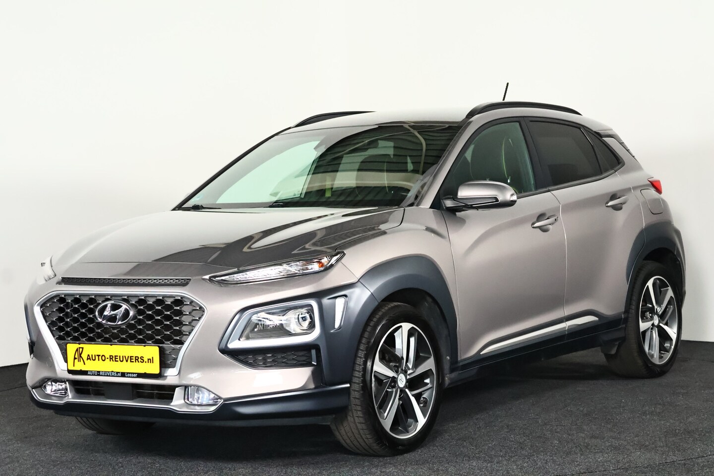 Hyundai Kona - 1.0T Premium / LED / CarPlay / Leder / Camera - AutoWereld.nl