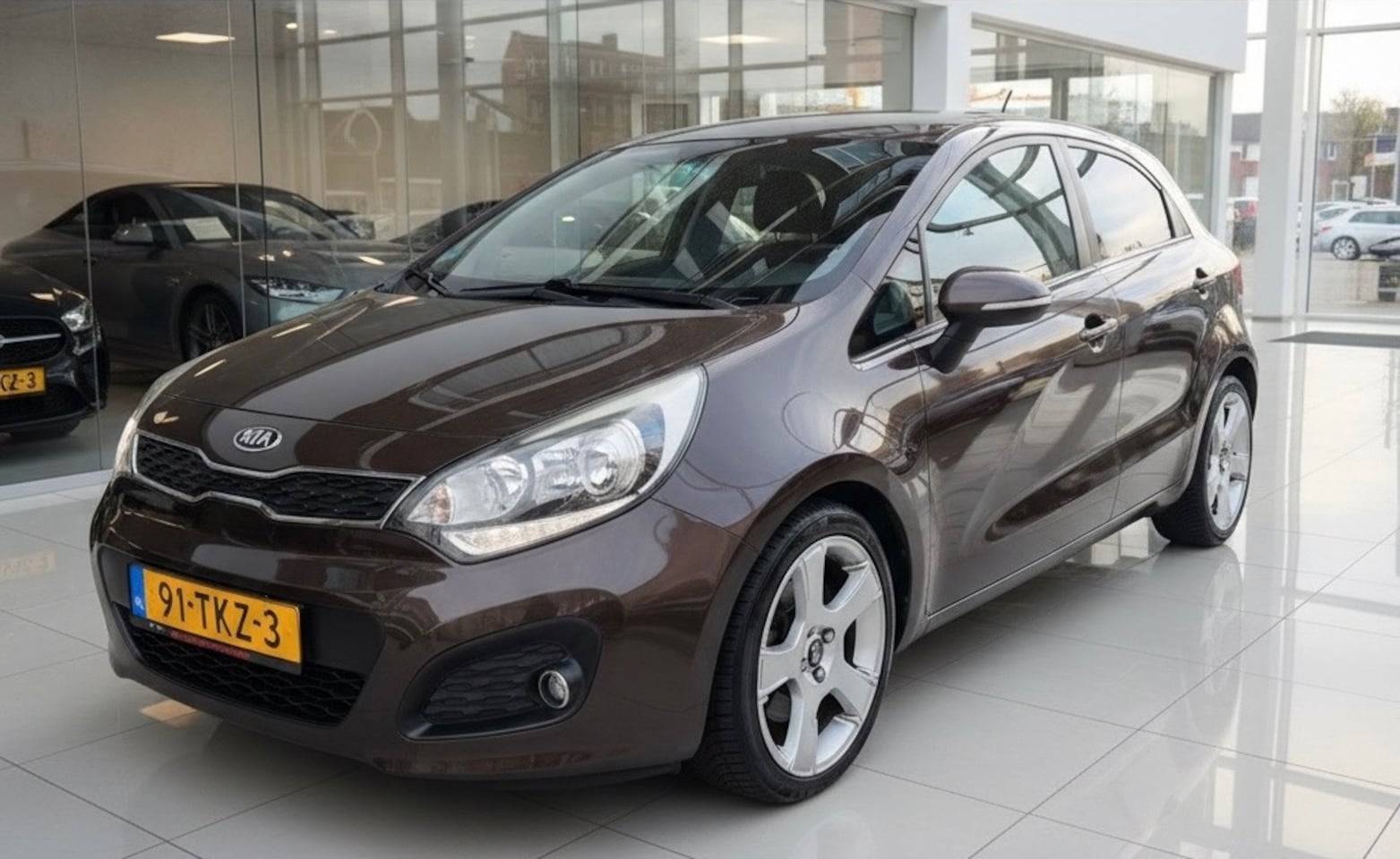 Kia Rio - 1.2 CVVT Super Pack-airco-1 jaar apk-elek ramen-pdc sensoren - AutoWereld.nl