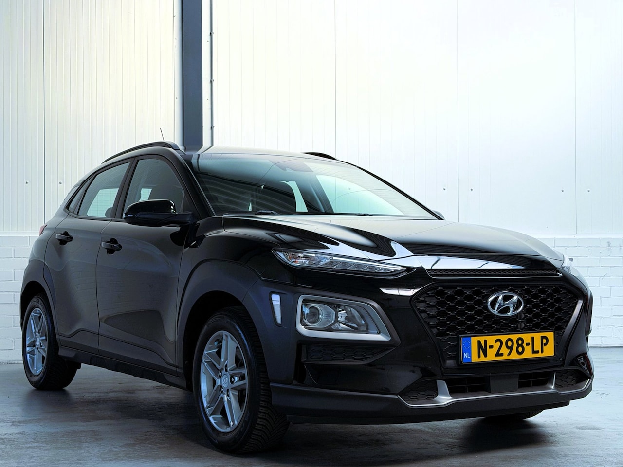 Hyundai Kona - 1.0T Fashion|Stoel-stuurverwarming|Camera|Trekhaak - AutoWereld.nl