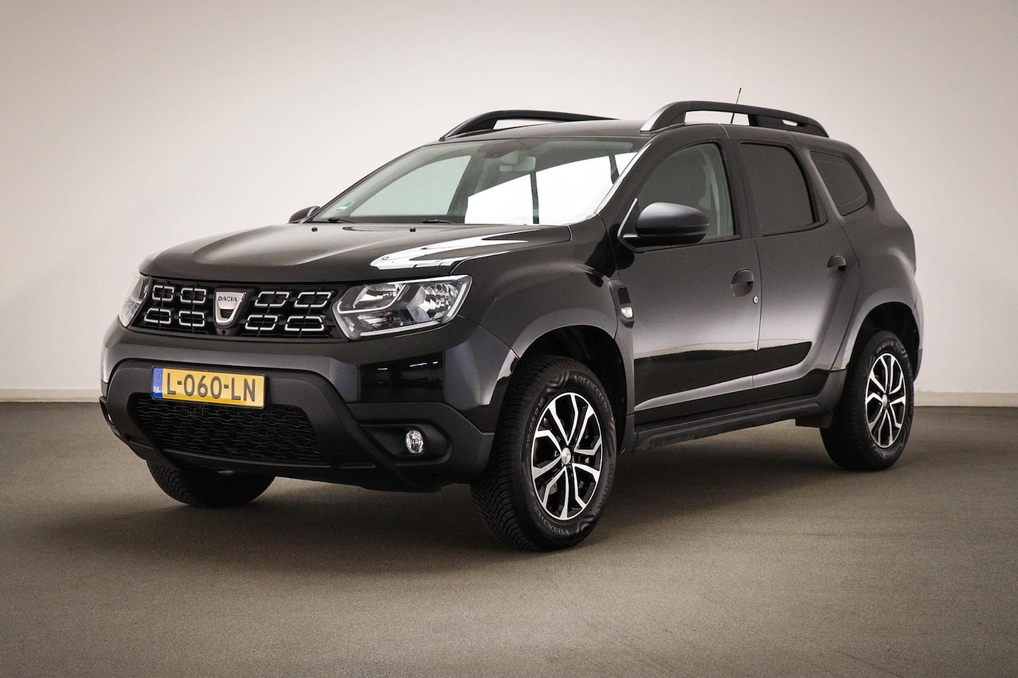 Dacia Duster - 1.2 TCe Comfort | AIRCO | CRUISE CONTROL | NAVIGATIE | CAMERA | TREKHAAK - AutoWereld.nl