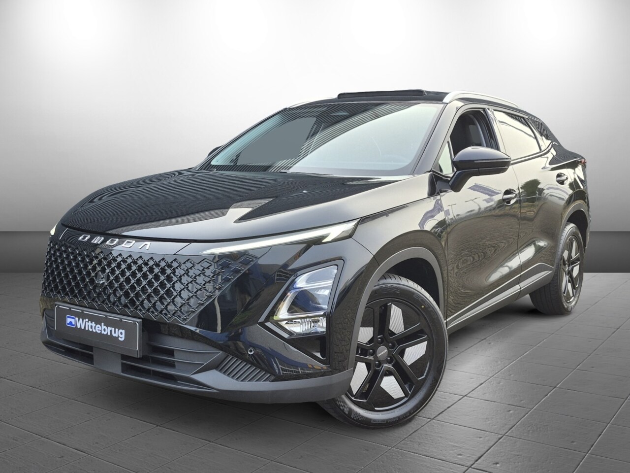 Omoda 5 - 1.6 T-GDi SHS-H Premium Full Hybride met Navigatie, Lederen bekleding en Camera Direct lev - AutoWereld.nl