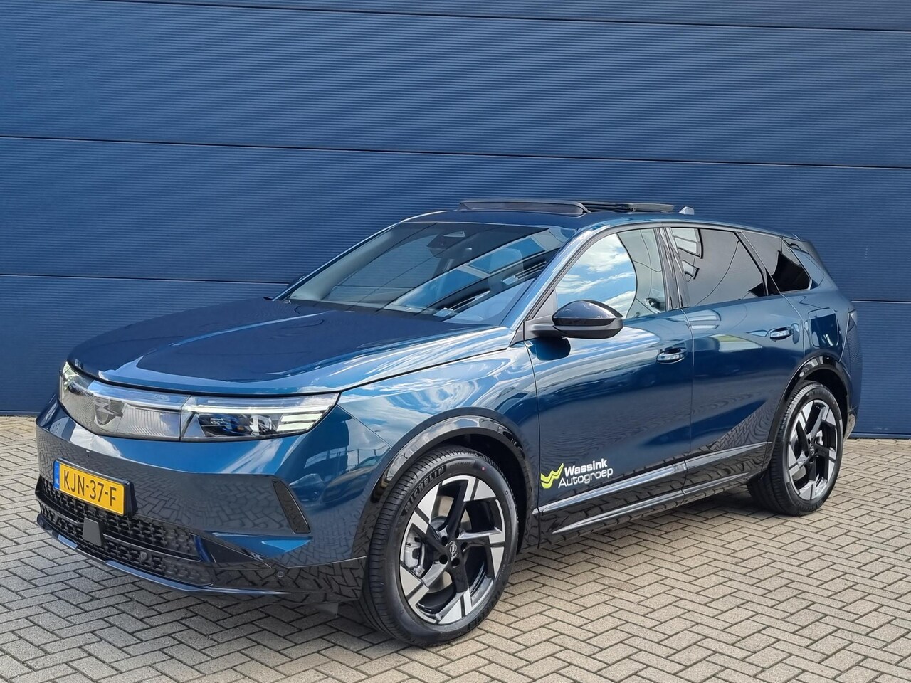 Opel Grandland Electric - Business Edition 97 kWh | Schuif-/Kanteldak | Camera | Stoel-/Stuurverwarming | 360 Graden - AutoWereld.nl