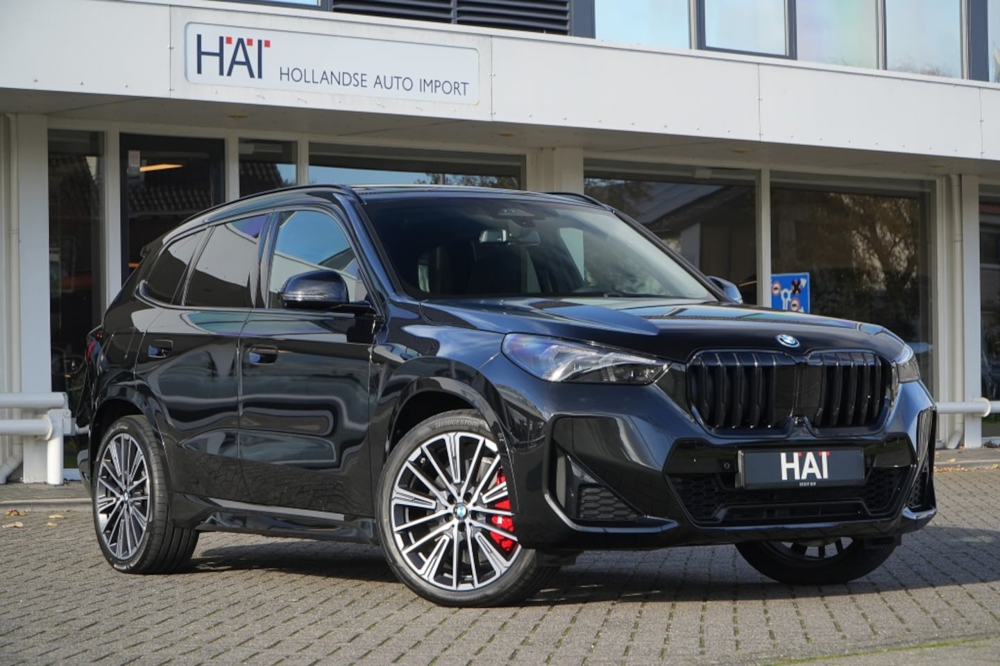 BMW X1 - xDrive30e M-Sport Pro 326 PK I Pano I HUD I Massage I Trekhaak I - AutoWereld.nl