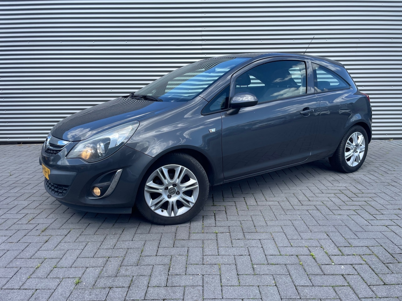 Opel Corsa - 1.4-16V bouwjaar 2012 met pano / cruise / lmv - AutoWereld.nl
