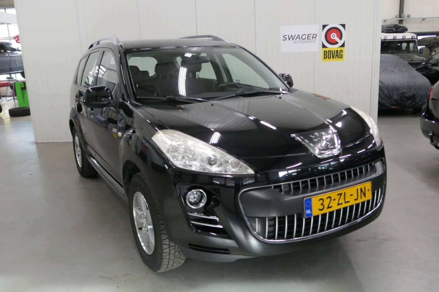 Peugeot 4007 - 2.4 16V 4WD 7PERS ST - AutoWereld.nl