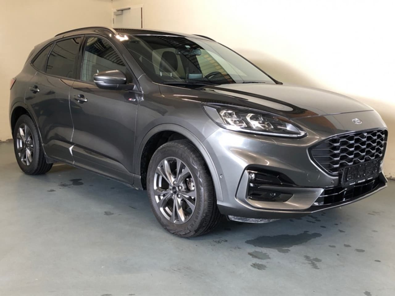 Ford Kuga - 2.5 PHEV ST-Line X - Automaat - Parkeerhulp V+A - Navi - Winterpakket - Elec.klep - AutoWereld.nl