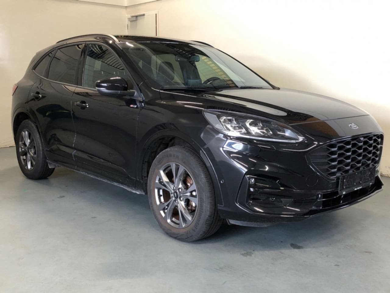 Ford Kuga - 2.5 PHEV ST-Line X - Automaat - Parkeerhulp V+A - Navi - Winterpakket - Elec.klep - AutoWereld.nl