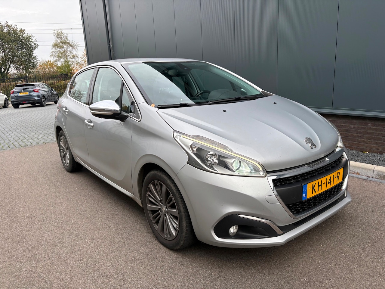 Peugeot 208 - 1.2 PureTech Blue Lease Executive HANDEL/EXPORT/Navigatie/Clima/Cruise/Half-Leer - AutoWereld.nl