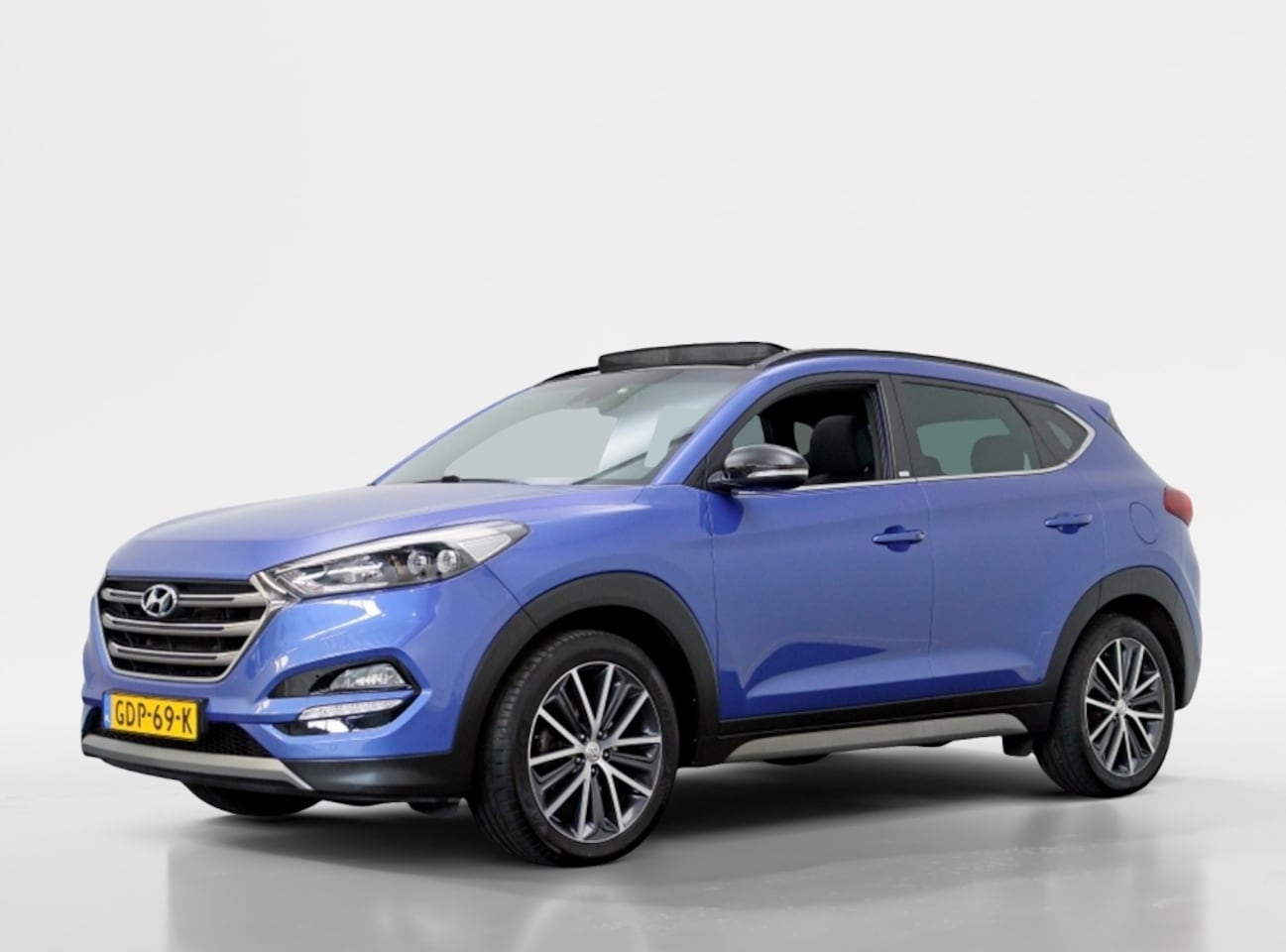 Hyundai Tucson - 1.6 T-GDi Comfort Plus Automaat | Panoramdak | Trekhaak | 4x stoelverwarming - AutoWereld.nl