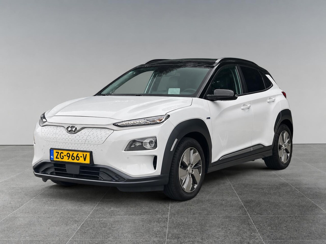 Hyundai Kona Electric - EV Premium 64kWh 204pk | PREMIUM LEDER | ADAPTIVE CRUISE | CAMERA | STOELVERW. + KOELING | - AutoWereld.nl