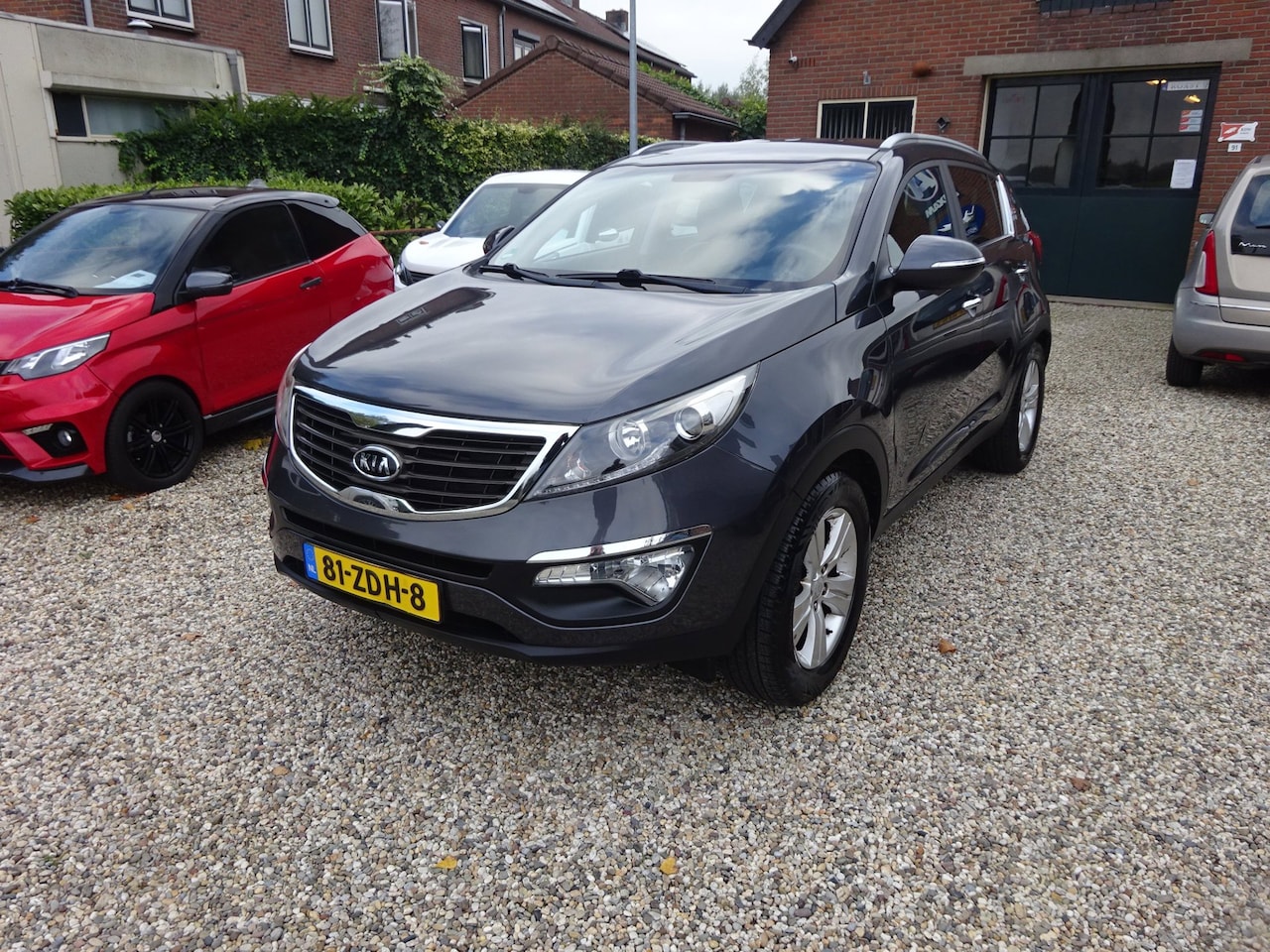 Kia Sportage - 1.6 GDI X-ecutive Plus Pack 1.6 GDI X-ecutive Plus Pack, Navigatie, Climate Controle, Cruise Controle, Trekhaak, Achte - AutoWereld.nl