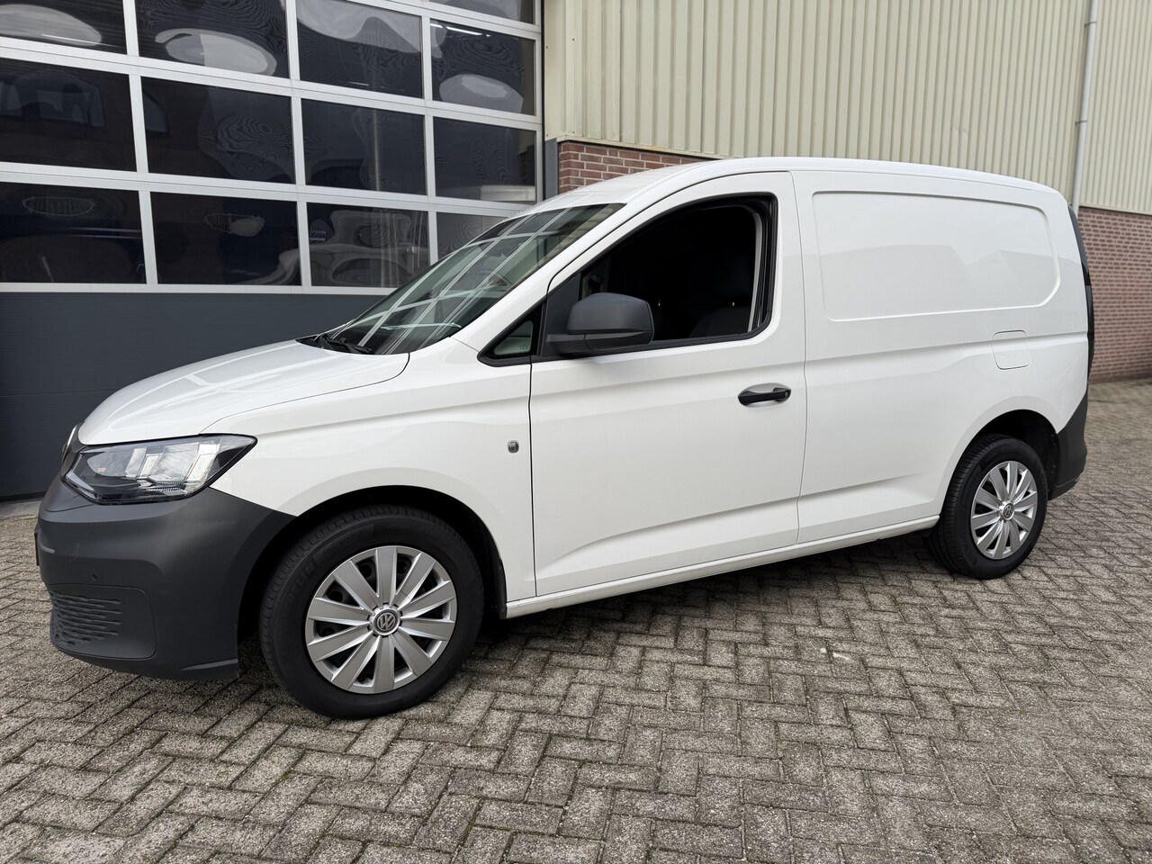 Volkswagen Caddy Cargo - 2.0 TDI 123pk Automaat Comf. Airco,Cruise,Navi,Pdc,Enz - AutoWereld.nl