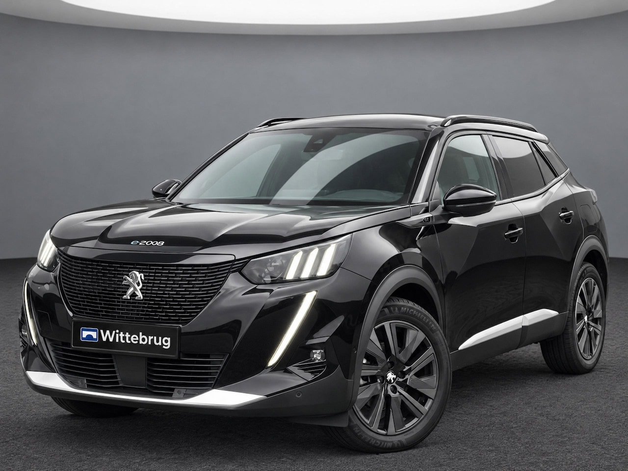 Peugeot e-2008 - EV GT Pack 50 kWh GT | Navi | Camera | Adaptive Cruise | Stoelverwarming | Keyless | Apple - AutoWereld.nl