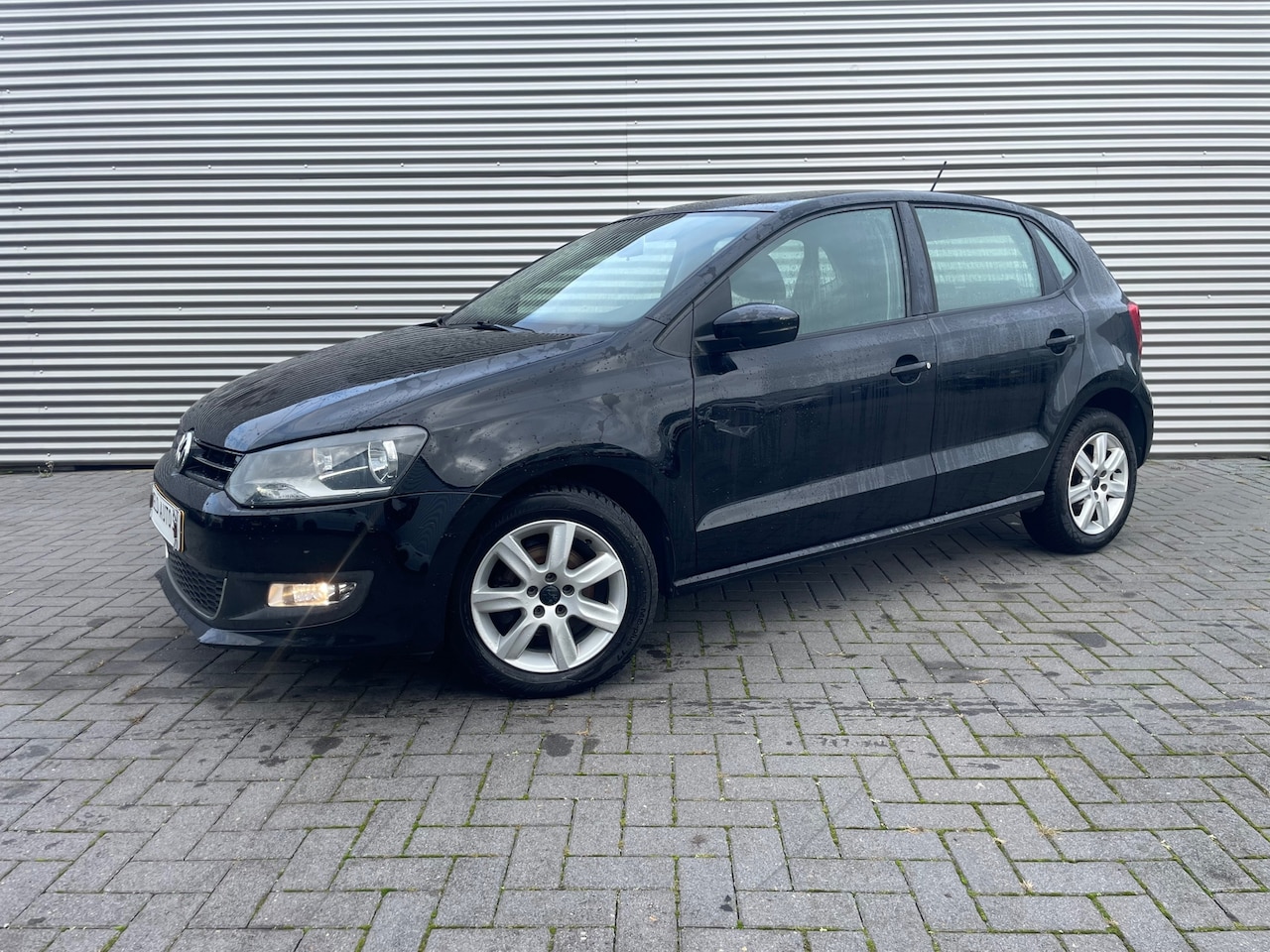 Volkswagen Polo - 1.2 TSI highline 2013 met cruise / climate / lmv - AutoWereld.nl