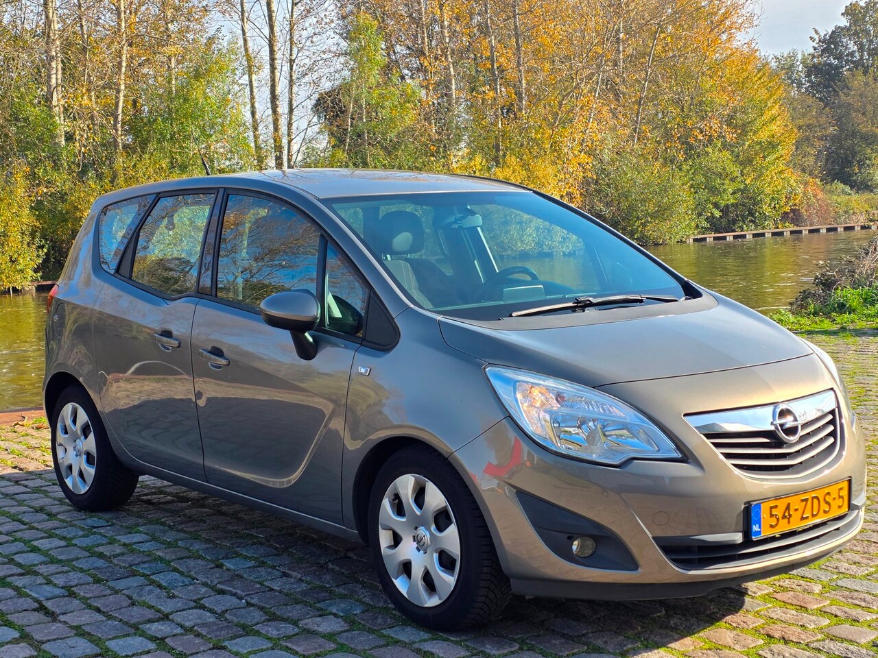 Opel Meriva - 1.4 Turbo Cosmo Automaat 2e eigenaar dealer onderhouden cruis control navigatie - AutoWereld.nl