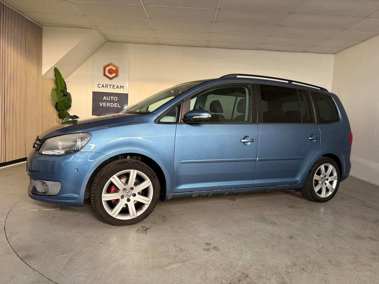 Volkswagen Touran - 1.2 TSI Easyline 7p. Airco, LMV, Navigatie - AutoWereld.nl