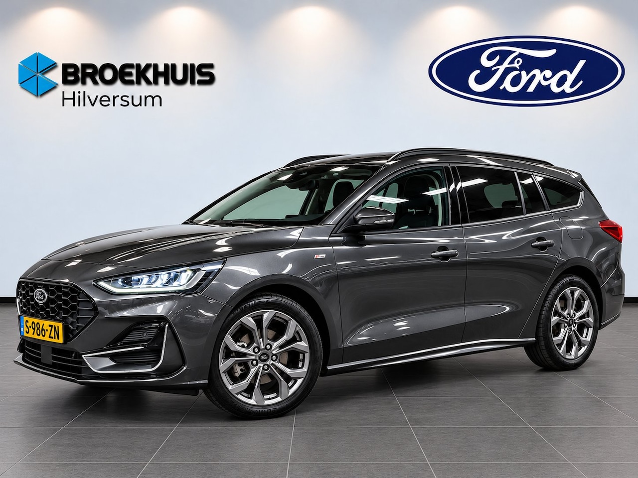 Ford Focus Wagon - 1.0 EcoBoost Hybrid ST Line 125pk | Winterpack | Wegklapbare Trekhaak | Navi - AutoWereld.nl