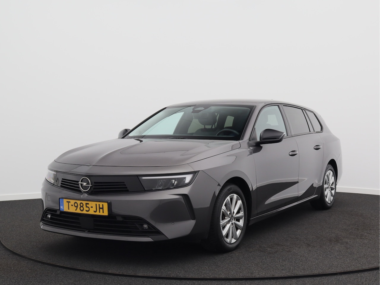 Opel Astra Sports Tourer - 1.2 Business Edition/ lage km/ automaat! - AutoWereld.nl