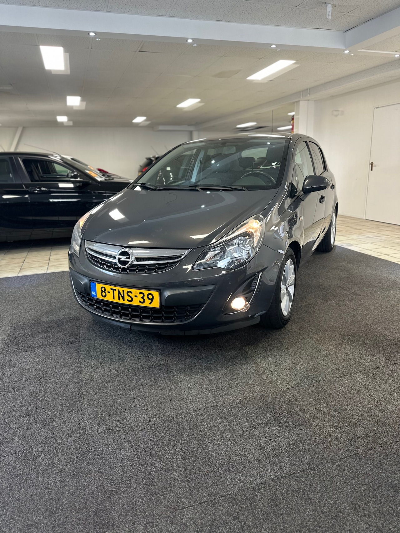 Opel Corsa - 1.4-16V Design Edition.NAP.Airco - AutoWereld.nl