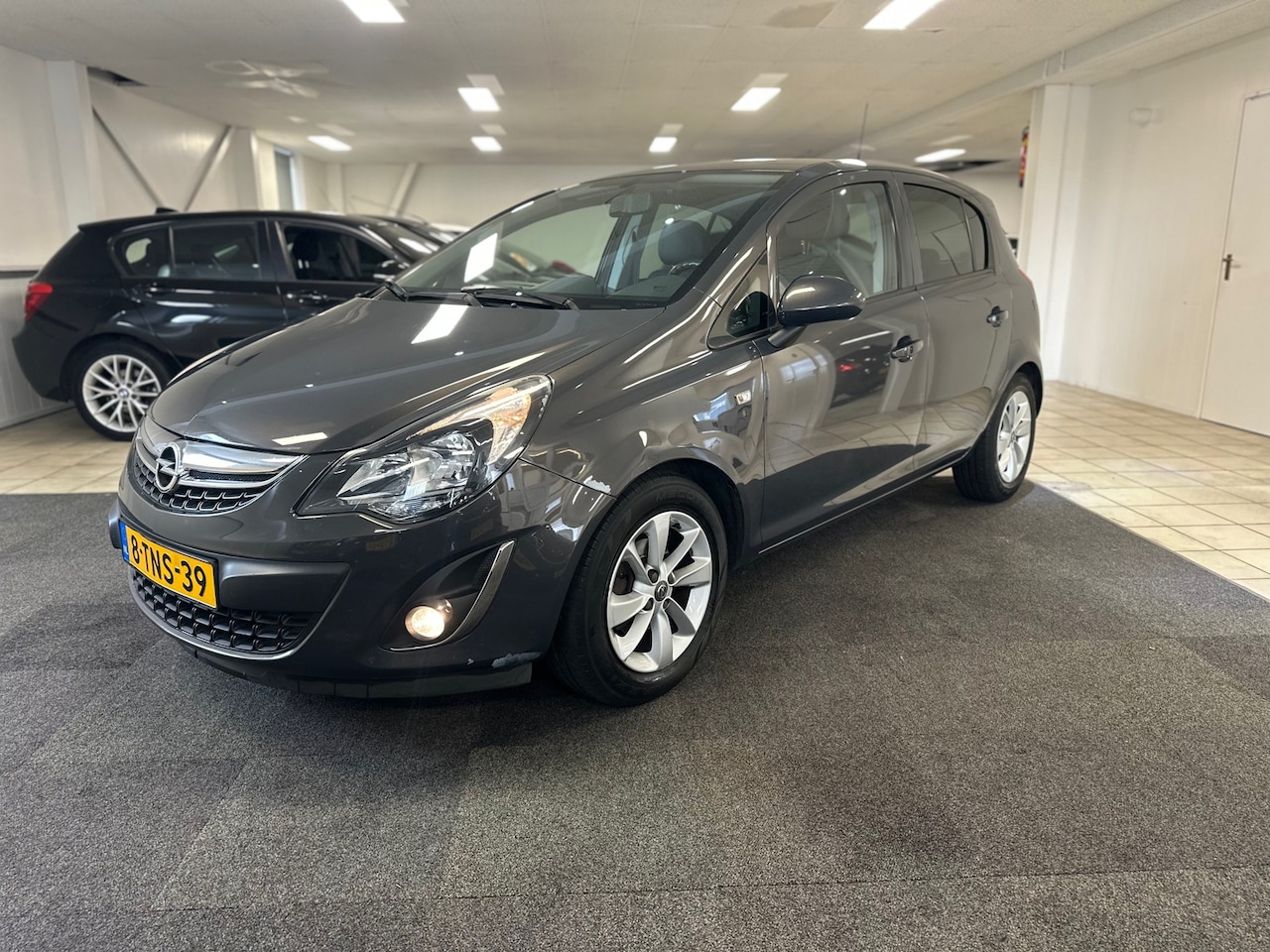Opel Corsa - 1.4-16V Design Edition.NAP.Airco - AutoWereld.nl