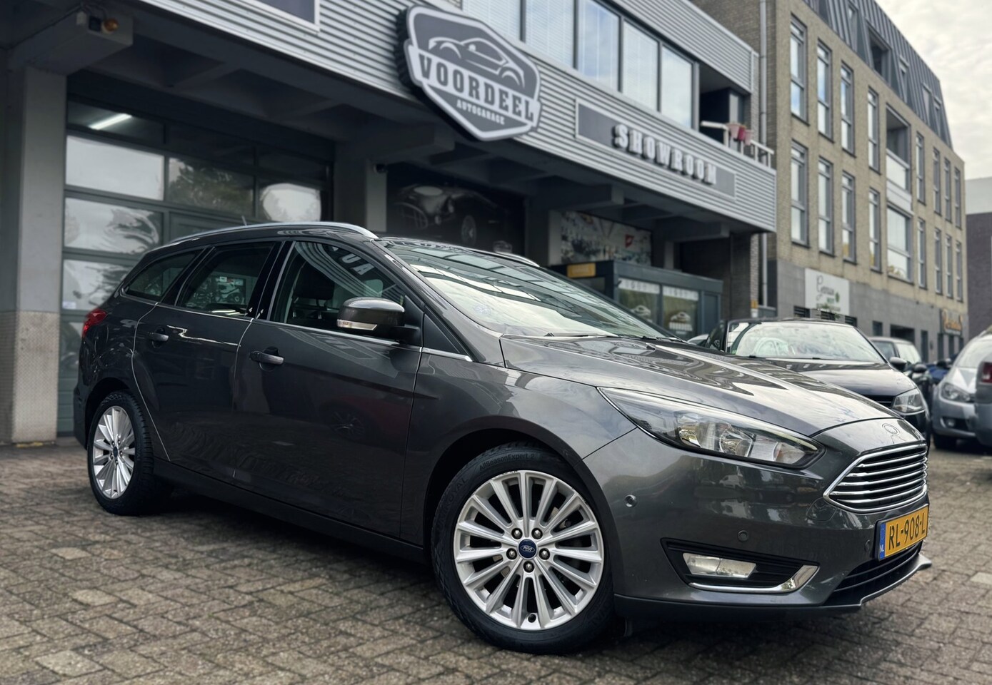 Ford Focus Wagon - 1.0 Titanium | NAVI | AIRCO | CRUISE | PDC | NAP | APK. - AutoWereld.nl