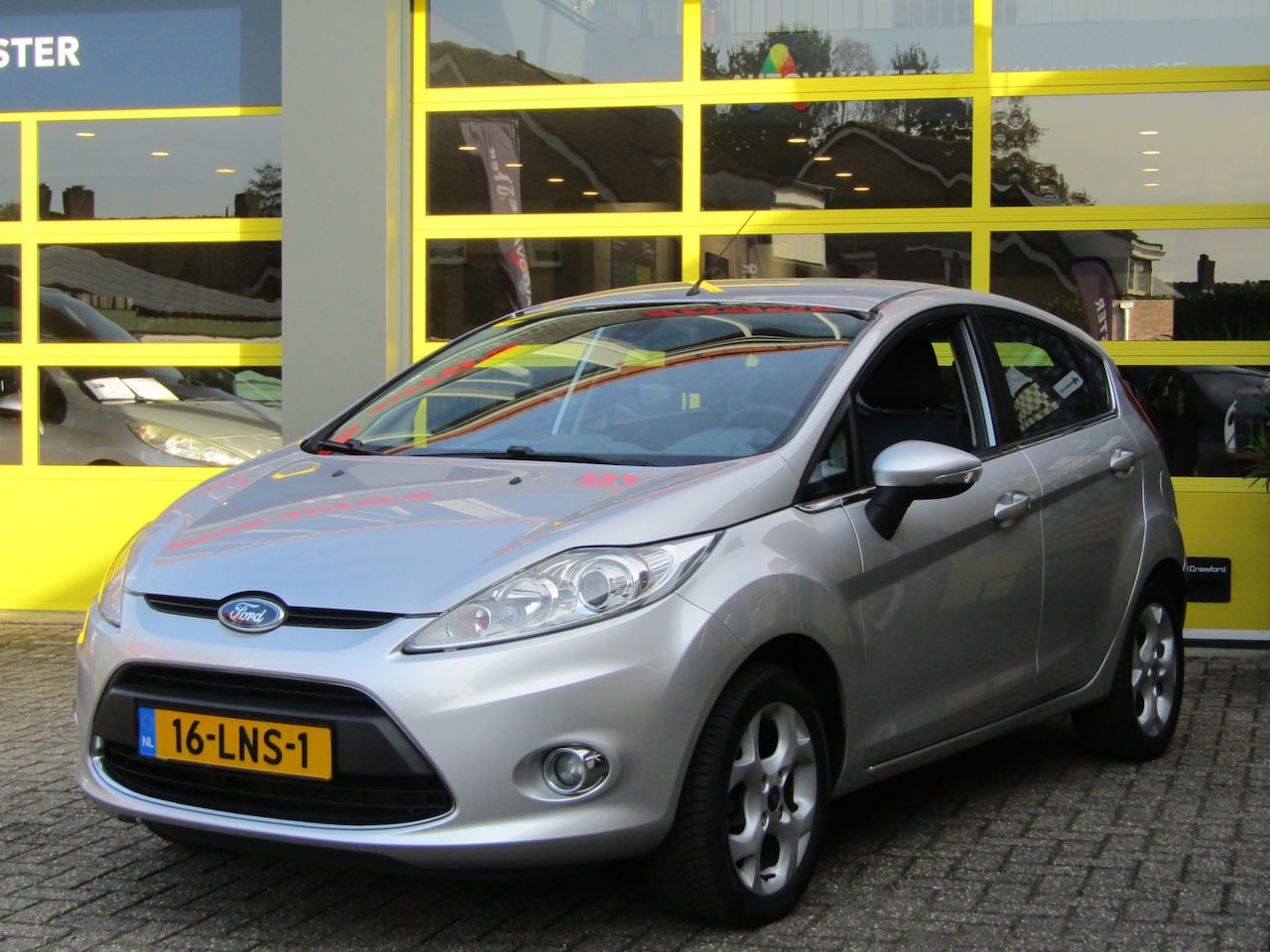 Ford Fiesta - 1.25 Titanium / 107413 km NAP / Cruis controle / PDC / clima - AutoWereld.nl