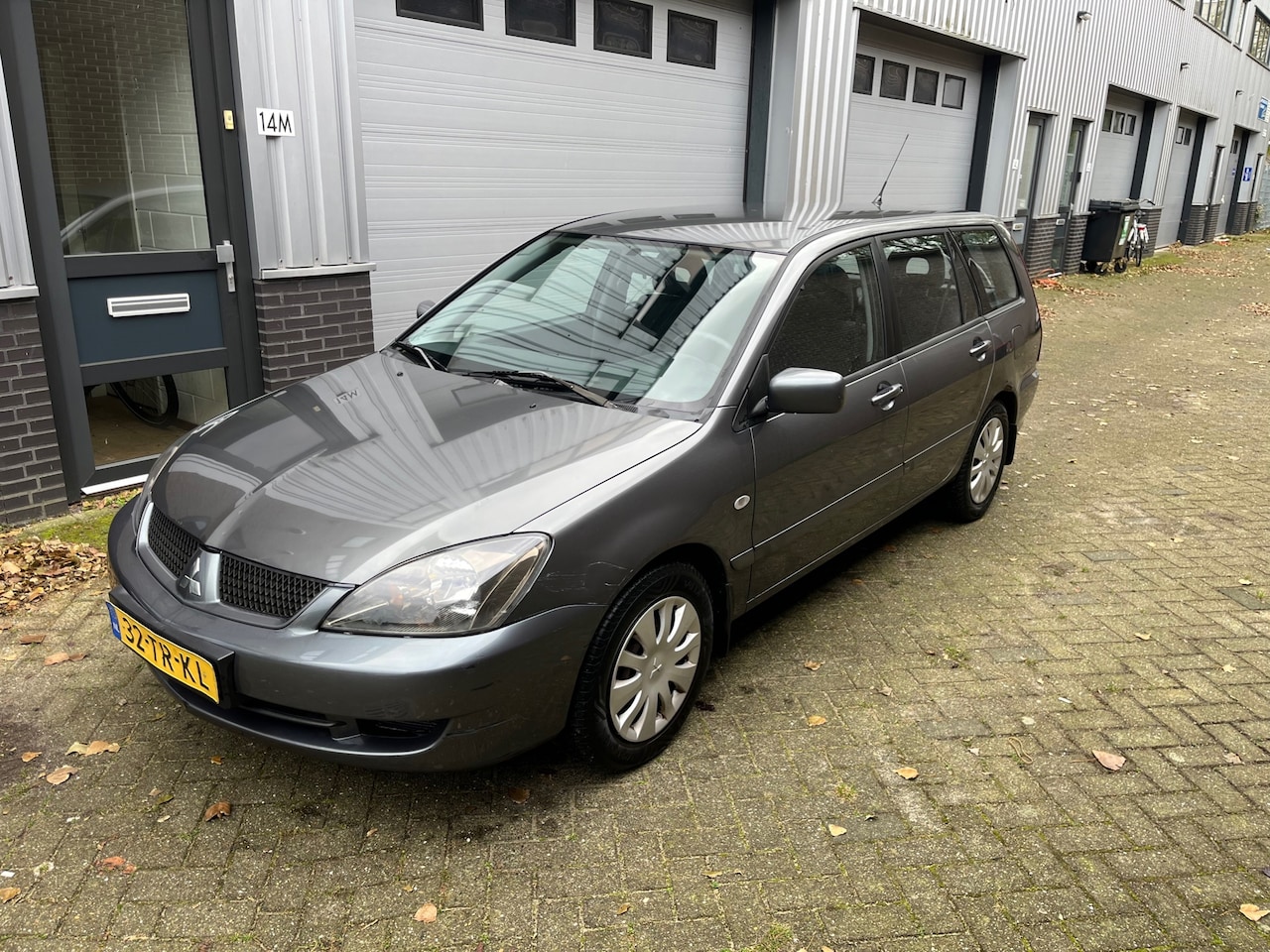 Mitsubishi Lancer Station Wagon - 1.6 Inform! Airco! Boekjes! - AutoWereld.nl