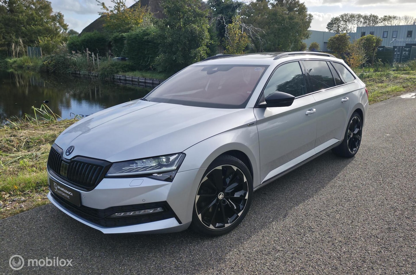 Skoda Superb Combi - 1.5 TSI ACT Sportline / Pano / Memory - AutoWereld.nl