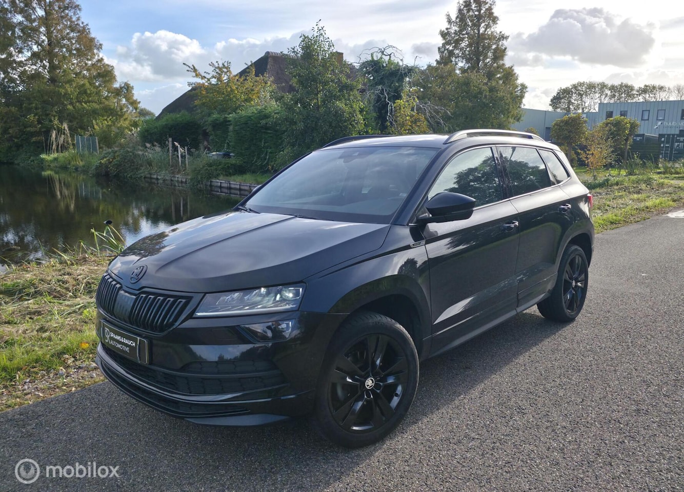 Skoda Karoq - 1.5 TSI ACT Sportline / Canton / Leder / Camera - AutoWereld.nl