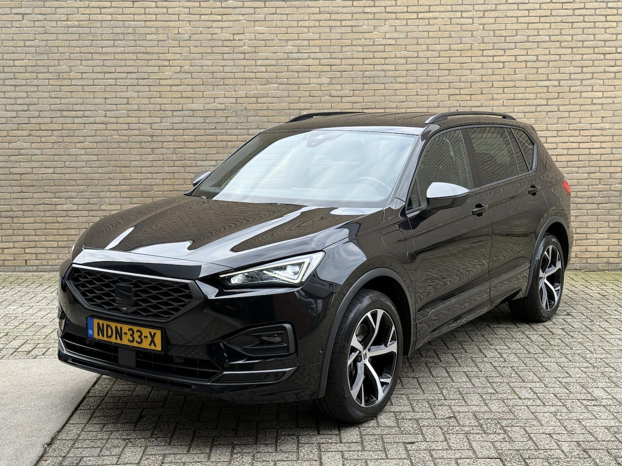 SEAT Tarraco - 1.4 TSI 245pk e-Hybrid PHEV FR | Trekhaak | Leder | 360 camera | Stoelverwarming voor&acht - AutoWereld.nl