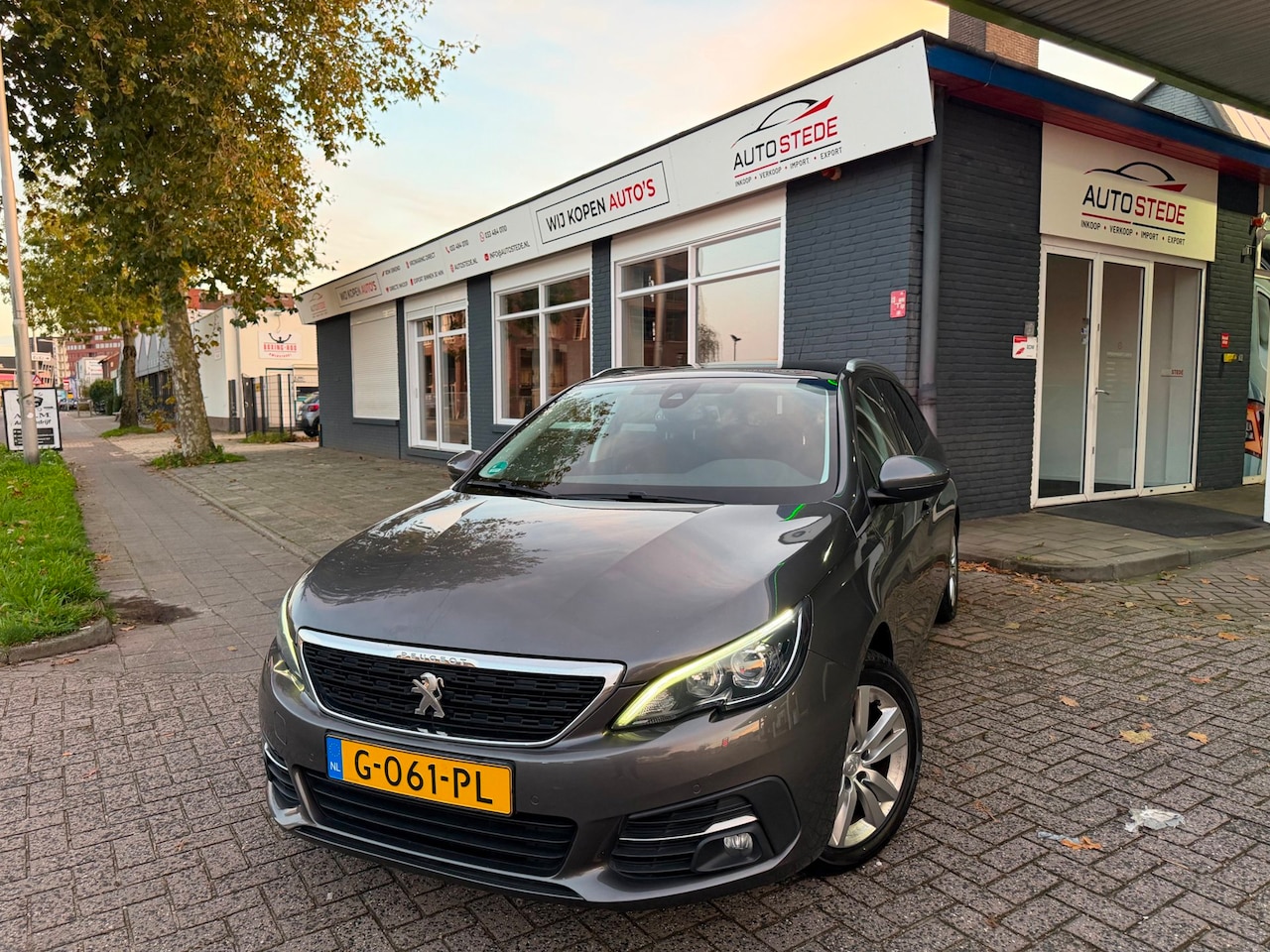 Peugeot 308 SW - 1.2 PureTech Blue Lease Executive|NAP|CRUISE|DISTRIBUTIE VV|NAVI|CAMERA - AutoWereld.nl
