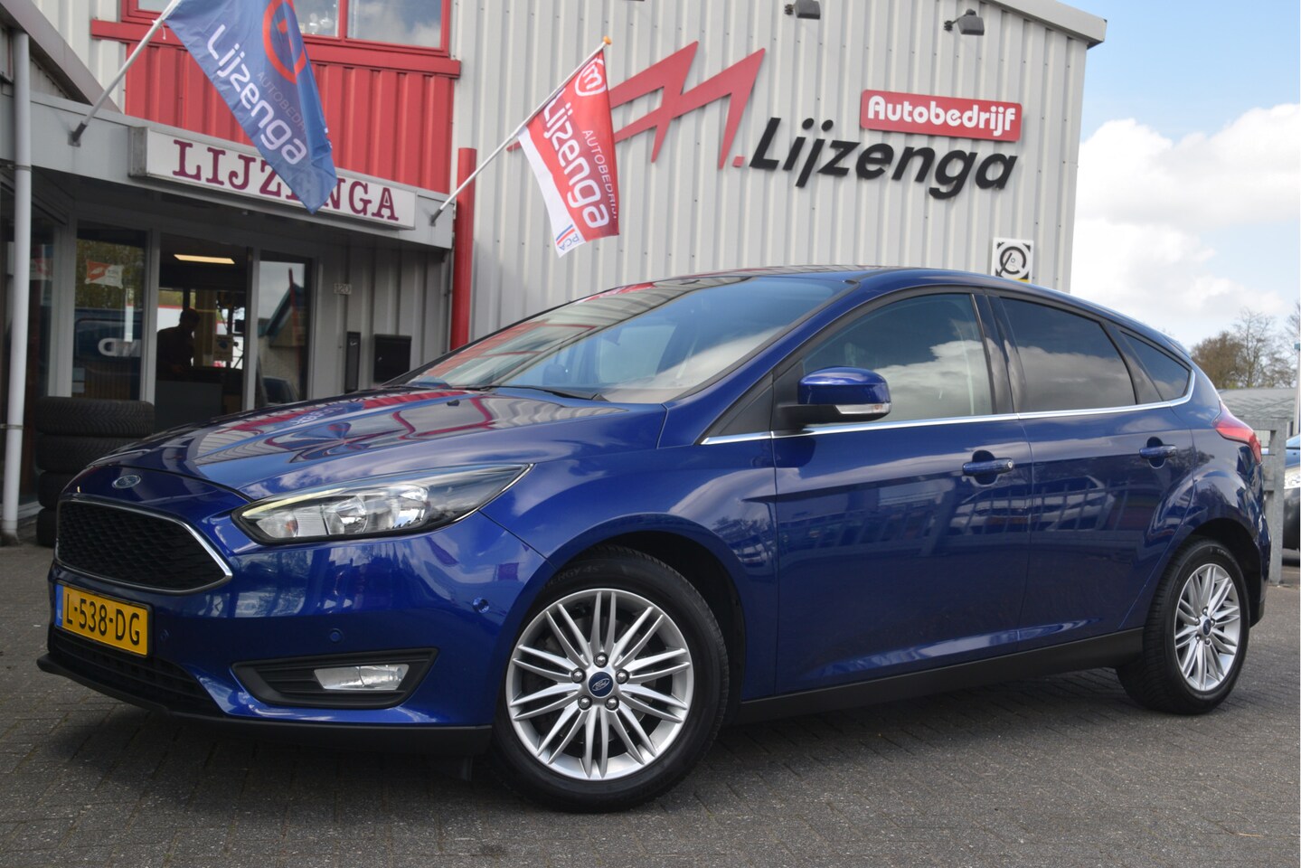 Ford Focus - 1.5 Titanium Navi | Clima | Cruise | PDC | Bluetooth | LMV - AutoWereld.nl