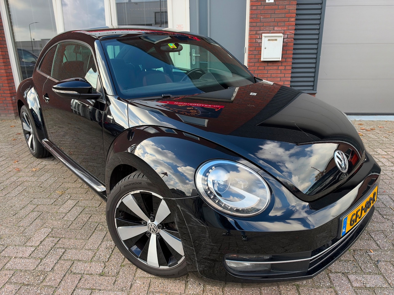 Volkswagen Beetle - 1.2 TSI Exclusive / Leder / Navi / Camera / PDC - AutoWereld.nl