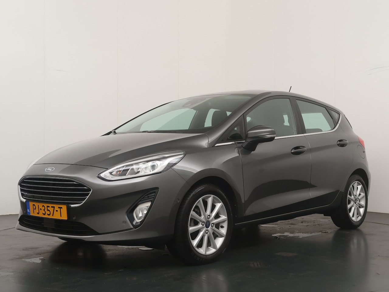 Ford Fiesta - 100PK EcoBoost Titanium | Dealeronderhouden | Voorruit verwarming | B&O | Clima | Adapt. c - AutoWereld.nl