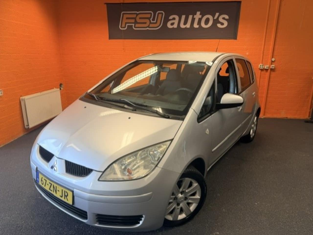 Mitsubishi Colt - 1.3 / 5 DEURS / INVITE / AIRCO!! - AutoWereld.nl