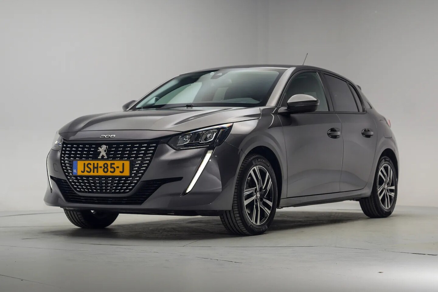 Peugeot 208 - 1.2 PureTech Allure Pack Aut. [ Stoelverwarming Camera Navi Apple/Android Clima Cruise ] - AutoWereld.nl
