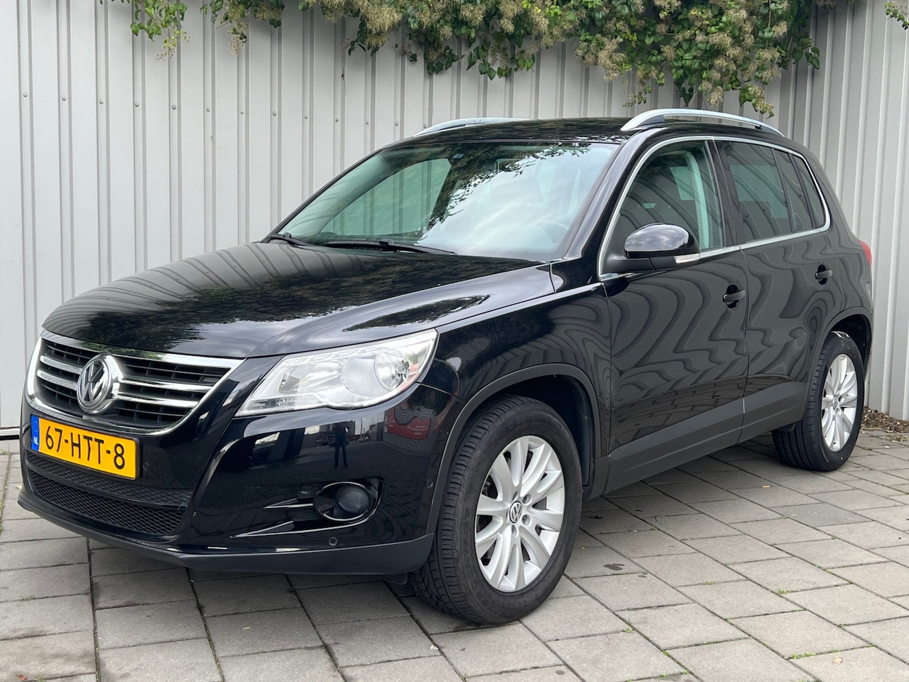 Volkswagen Tiguan - 1.4 TSI Sport&Style 4Motion|83000KM|Navigatie|Climate Control| - AutoWereld.nl