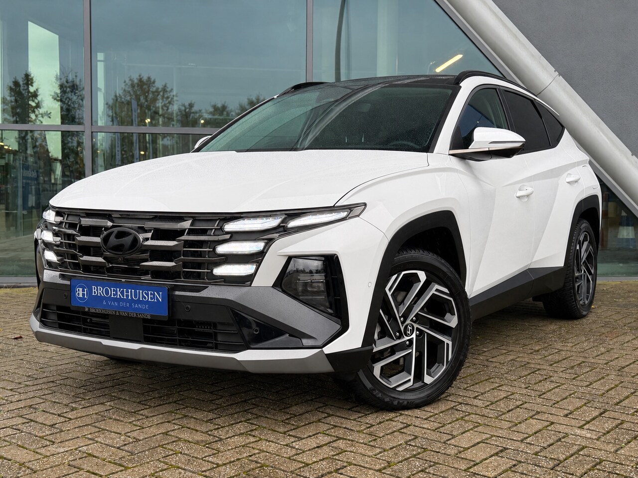 Hyundai Tucson - 1.6 T-GDI PHEV Premium Sky 4WD 265pk Leder / Panoramadak / 360 Camera / Head up display - AutoWereld.nl