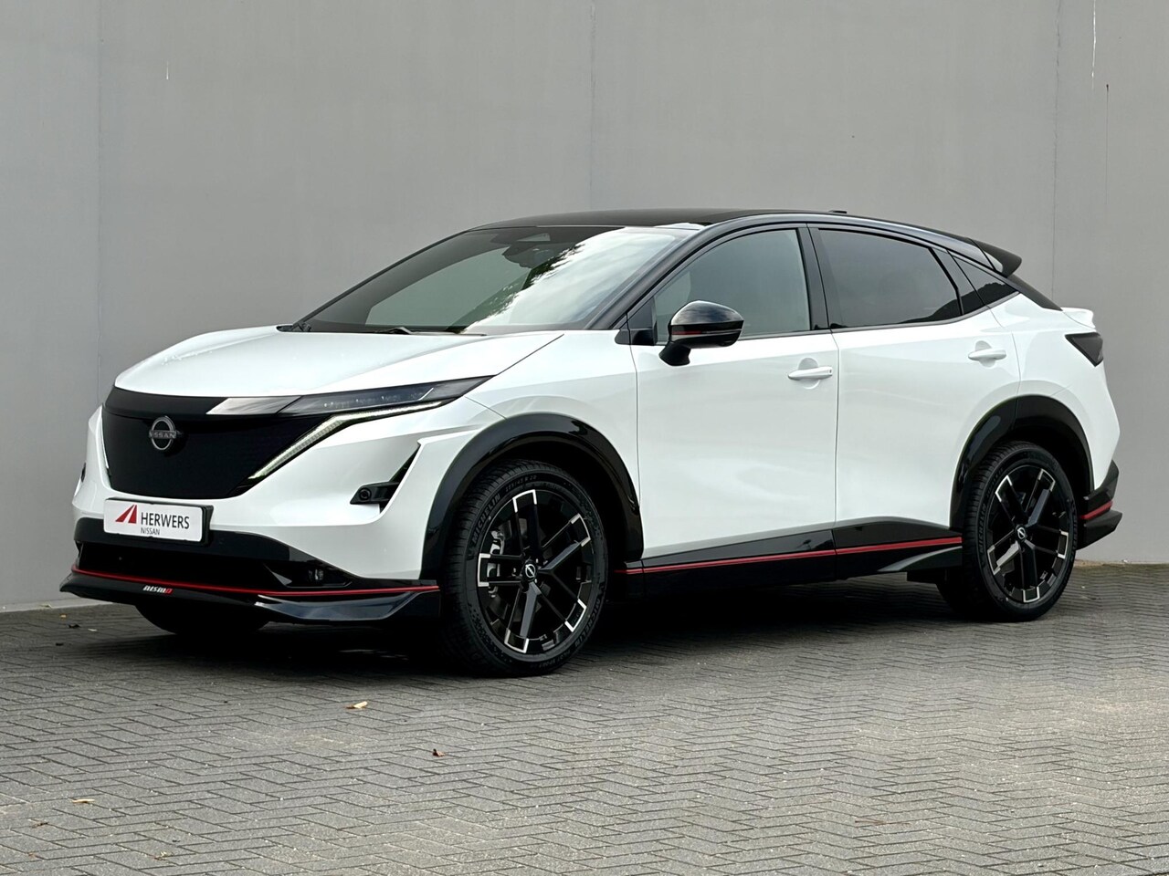 Nissan Ariya - e-4ORCE Nismo 91 kWh / 435PK / 417KM WLTP / Alcantara Interieur / F1-Remlicht / Adaptieve - AutoWereld.nl
