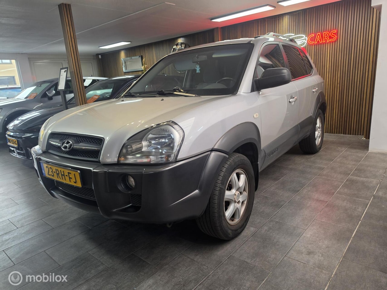 Hyundai Tucson - 2.0i Dynamic | Navigatie | Airco | Db Riem v.v - AutoWereld.nl